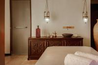 Sharq Village & Spa, a Ritz-Carlton Hotelにあるベッド