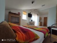 Posteľ alebo postele v izbe v ubytovaní Apartments Antonija