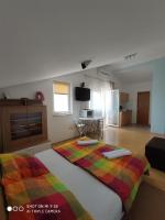 Posteľ alebo postele v izbe v ubytovaní Apartments Antonija