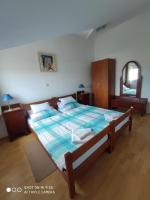 Posteľ alebo postele v izbe v ubytovaní Apartments Antonija