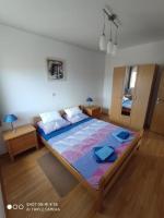 Posteľ alebo postele v izbe v ubytovaní Apartments Antonija