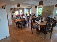 Un restaurant sau alt loc unde se poate mânca la Hotel Scharfes Eck