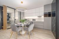 Kuchnia lub aneks kuchenny w obiekcie Apartamenty Fenomen - Premium Porto Nadmorskie Tarasy w Kołobrzegu