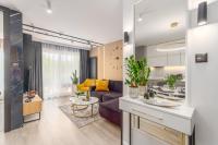Część wypoczynkowa w obiekcie Apartamenty Fenomen - Premium Porto Nadmorskie Tarasy w Kołobrzegu