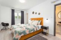 Postel nebo postele na pokoji v ubytování Holiday Home Greta