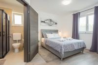Postel nebo postele na pokoji v ubytování Holiday Home Greta
