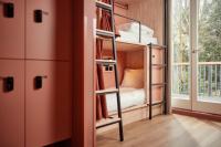 Ein Bett oder Betten in einem Zimmer der Unterkunft The Elephant Hostel