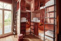 Ein Bett oder Betten in einem Zimmer der Unterkunft The Elephant Hostel