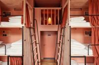 Ein Bett oder Betten in einem Zimmer der Unterkunft The Elephant Hostel