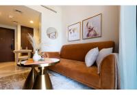 Posezení v ubytování Keyrock Living - Luxury 1BR Apartment with Lake View in Business Bay