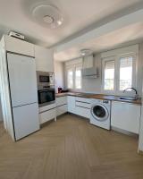 Kuchyň nebo kuchyňský kout v ubytování Precioso apartamento con piscina