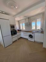 Kuchyň nebo kuchyňský kout v ubytování Precioso apartamento con piscina