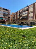 Bazén v ubytování Precioso apartamento con piscina nebo v jeho okolí