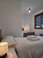 Postel nebo postele na pokoji v ubytování Manuel Guesthouse Arta terme