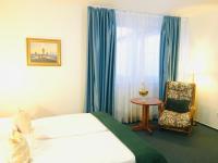 Postel nebo postele na pokoji v ubytování Penzion Hotelu Central