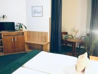 Postel nebo postele na pokoji v ubytování Penzion Hotelu Central