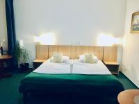 Postel nebo postele na pokoji v ubytování Penzion Hotelu Central