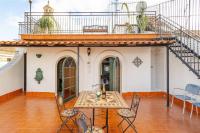 A balcony or terrace at Palazzo Viola Suite Panoramica Palermo