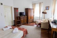 Posteľ alebo postele v izbe v ubytovaní Hotel Napoleon