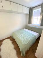 A bed or beds in a room at Chalet Badberg