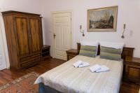 Posteľ alebo postele v izbe v ubytovaní Hotel Napoleon