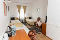 Posteľ alebo postele v izbe v ubytovaní Hotel Napoleon