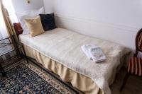 Posteľ alebo postele v izbe v ubytovaní Hotel Napoleon