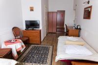 Posteľ alebo postele v izbe v ubytovaní Hotel Napoleon