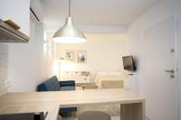 Televízia a/alebo spoločenská miestnosť v ubytovaní Studio Apartment Jon