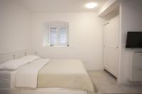Posteľ alebo postele v izbe v ubytovaní Studio Apartment Jon