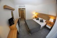 Postel nebo postele na pokoji v ubytování Ozyigit Otel