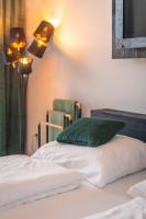Postel nebo postele na pokoji v ubytování KOREK Mikulov apartmán