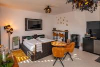 Postel nebo postele na pokoji v ubytování KOREK Mikulov apartmán