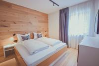 Ein Bett oder Betten in einem Zimmer der Unterkunft Mariandl im Oberwirt