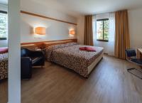 Łóżko lub łóżka w pokoju w obiekcie Bonotto Hotel Palladio