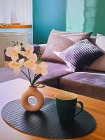 Łóżko lub łóżka w pokoju w obiekcie Okno na Śnieżkę, Apartament z 2 Łazienkami, tarasem, ogrodem, parkingiem i pięknym widokiem