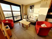 Część wypoczynkowa w obiekcie Duplex avec balcon, parking, animaux admis, et Wi-Fi - FR-1-675-2
