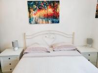 A bed or beds in a room at CASA MAFALDA - Rooms, friends and more - Affittacamere, Guest House