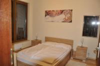 Posteľ alebo postele v izbe v ubytovaní Olympic Park Apartment