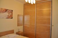 Posteľ alebo postele v izbe v ubytovaní Olympic Park Apartment