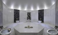 a large white bathroom with two sinks and a tub at Mandarin Oriental, Bodrum in Golturkbuku
