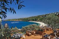 a restaurant with a view of a beach at Mandarin Oriental, Bodrum in Golturkbuku