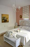 Postel nebo postele na pokoji v ubytování Myrtia - Cretan Guest House