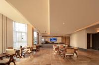 Una televisión o centro de entretenimiento en Atour Hotel Shanghai Hongqiao Shuicheng Road