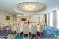 Una televisión o centro de entretenimiento en Moganshan Hotel