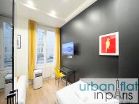 Televízia a/alebo spoločenská miestnosť v ubytovaní 156 - Urban YSL Flat in Montorgueil
