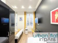 Televízia a/alebo spoločenská miestnosť v ubytovaní 156 - Urban YSL Flat in Montorgueil