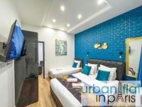Televízia a/alebo spoločenská miestnosť v ubytovaní 156 - Urban YSL Flat in Montorgueil