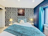 Posteľ alebo postele v izbe v ubytovaní Suite Isaac - Appartement d'exception