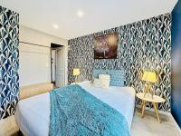 Posteľ alebo postele v izbe v ubytovaní Suite Isaac - Appartement d'exception